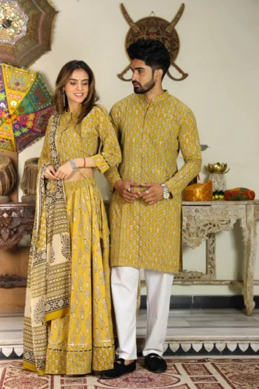 indian yellow beautiful couple lehenga choli side view