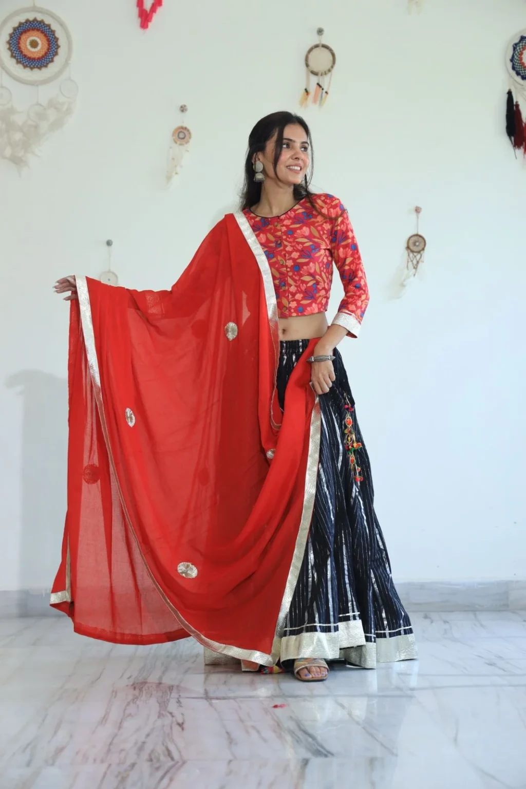 black and red lehenga choli side view